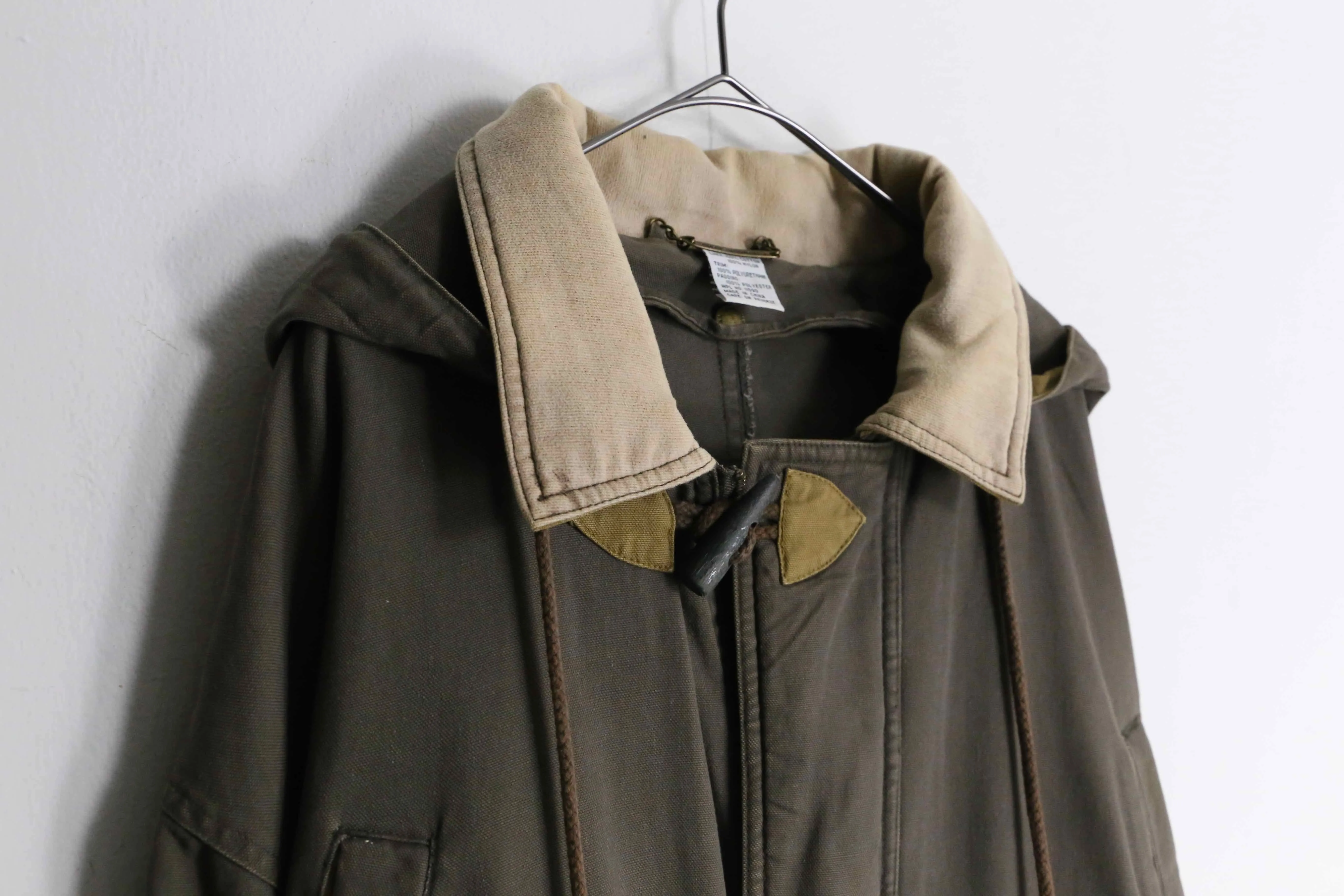 hunting motif khaki color duffel coat